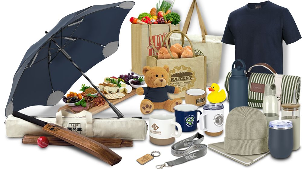 Collage of promotional products including branded umbrella, tote bags, T-shirt, teddy bear, drink bottles, mugs, lanyard, picnic blanket, and beanie.