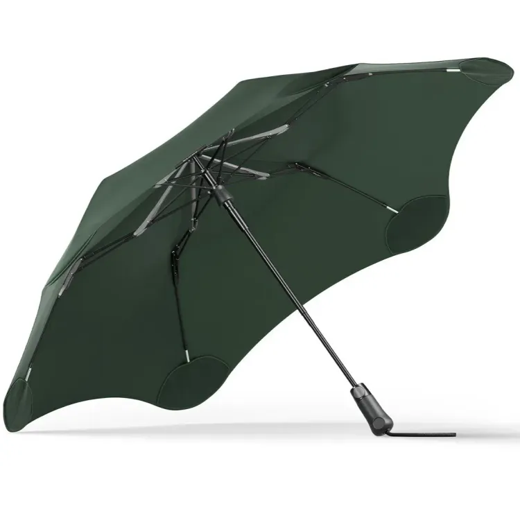 Underside view of BLUNT Metro Umbrella in forest green showing frame and canopy supports