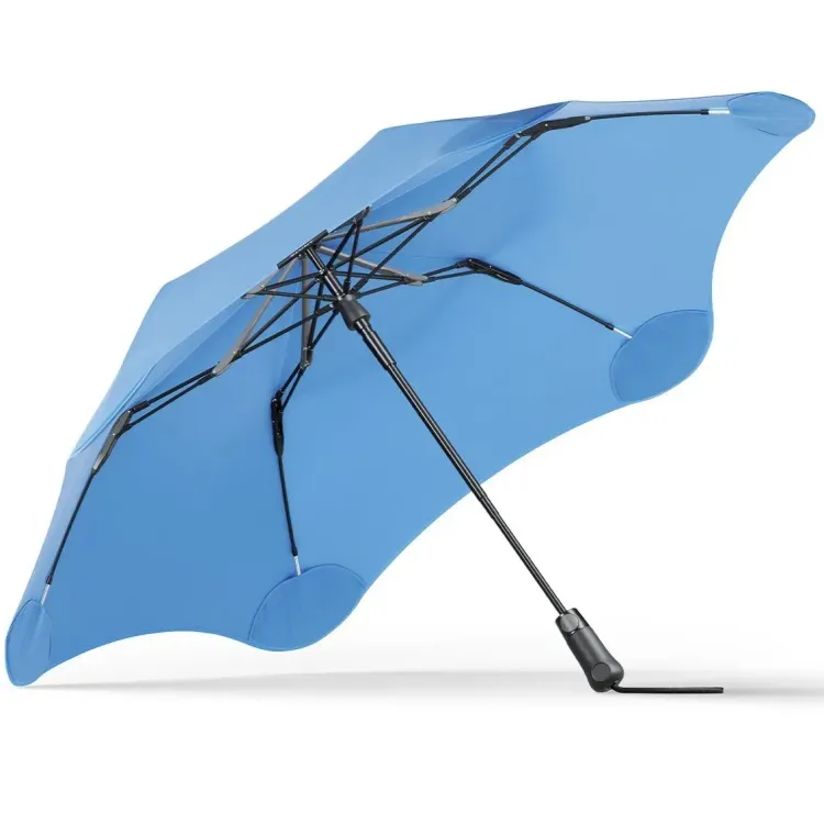 Underside view of BLUNT Metro Umbrella in sky blue showing six-rib frame and black handle