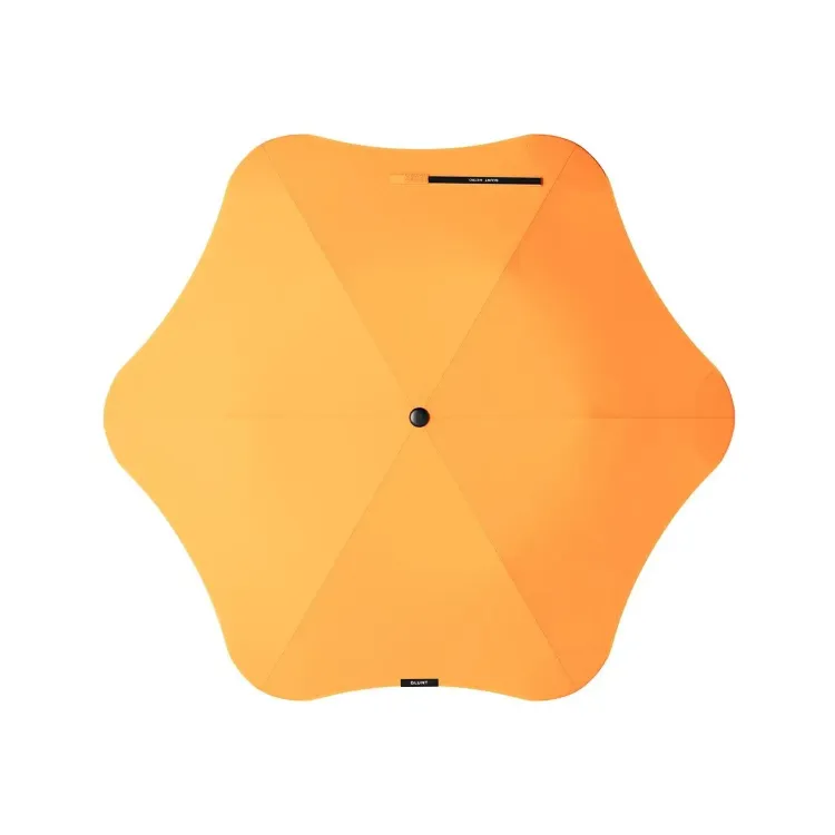 Top-down view of BLUNT Metro Umbrella in mango orange showing full six-panel canopy