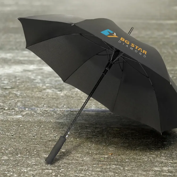 Cirrus umbrella in black with printed logo, open underside view on wet pavement