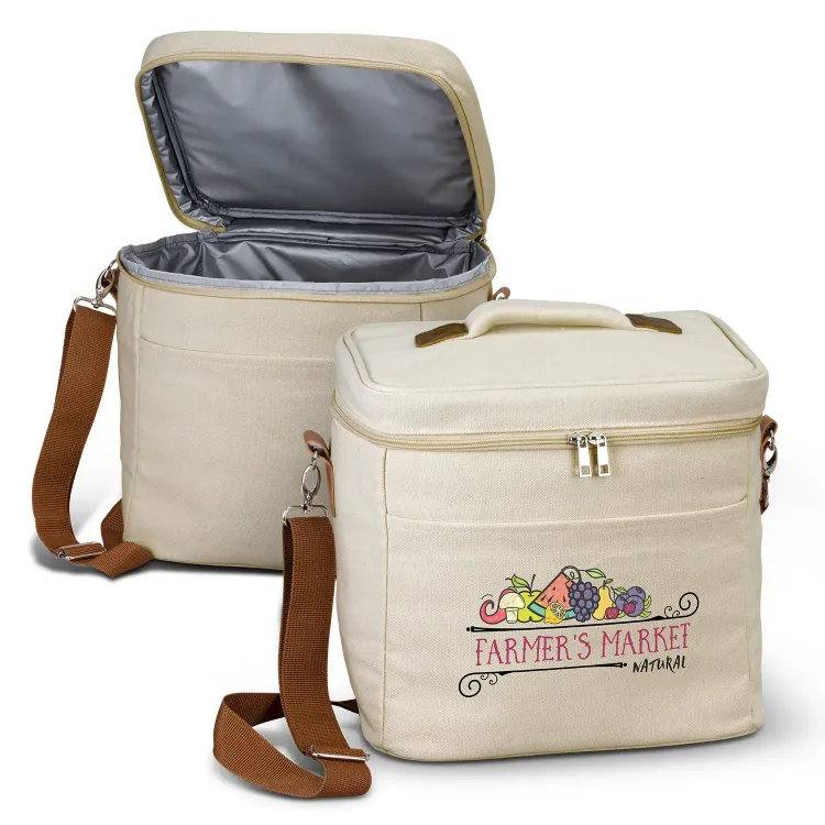 Colton Cooler Bag in natural cotton canvas with brown shoulder strap and zippered lid open.
