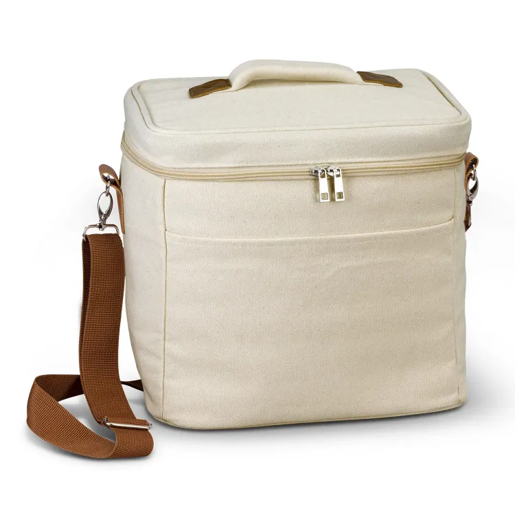 Colton Cooler Bag in natural cotton canvas with brown adjustable shoulder strap and zippered top.