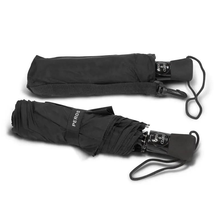 Two closed Metropolitan umbrellas in black, one folded and one in matching sleeve with wrist straps