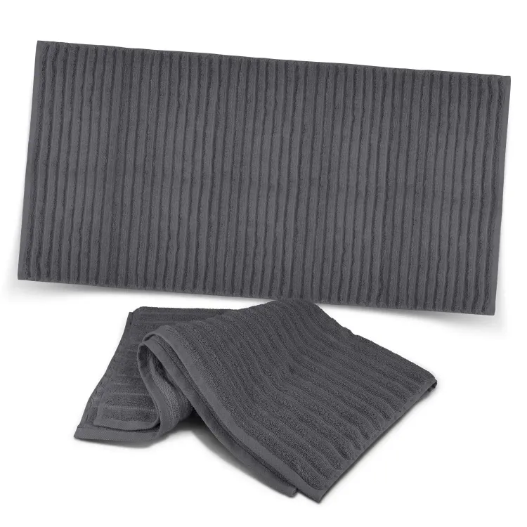 Palms Luxury Towel in charcoal grey with ribbed texture, folded and displayed flat.