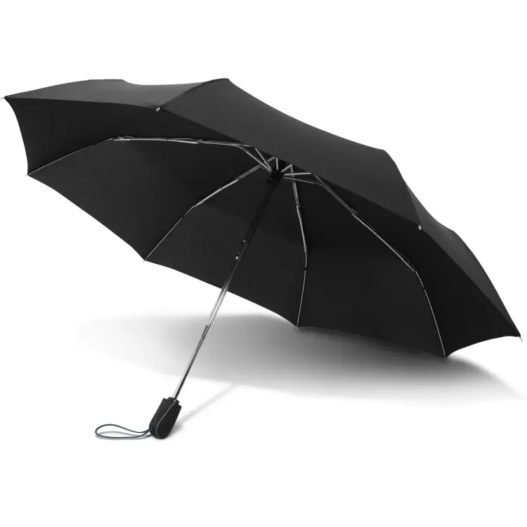 Swiss Peak Traveller Umbrella in black shown fully open with chrome frame, ergonomic handle, and matching wrist strap