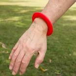 Wrist Disc Silicone Flyer - Red on Wrist
