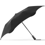 Side profile of BLUNT Metro Umbrella in ink black showing aerodynamic canopy and sturdy black shaft