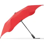 Side profile of BLUNT Metro Umbrella in red with black shaft and handle