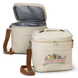 Colton Cooler Bag in natural cotton canvas with brown shoulder strap and zippered lid open.