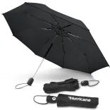 Hurricane City umbrella in black, open underside view with two closed umbrellas, one in branded sleeve