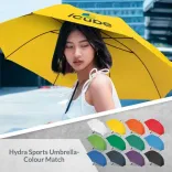 Person holding Hydra Sports umbrella in yellow, open profile view with colour range below