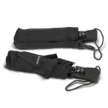Two closed Metropolitan umbrellas in black, one folded and one in matching sleeve with wrist straps
