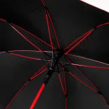 Inside view of open Monsoon umbrella in black with red shaft and ribs