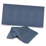 Palms Luxury Towel in slate blue with ribbed texture, shown folded and laid flat.